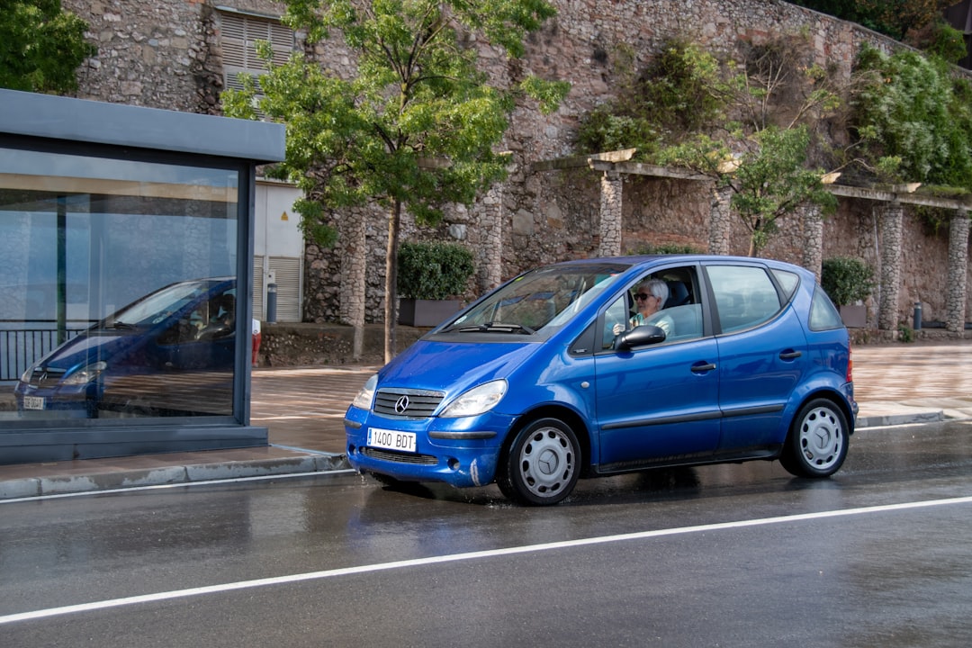 a blue car on the road