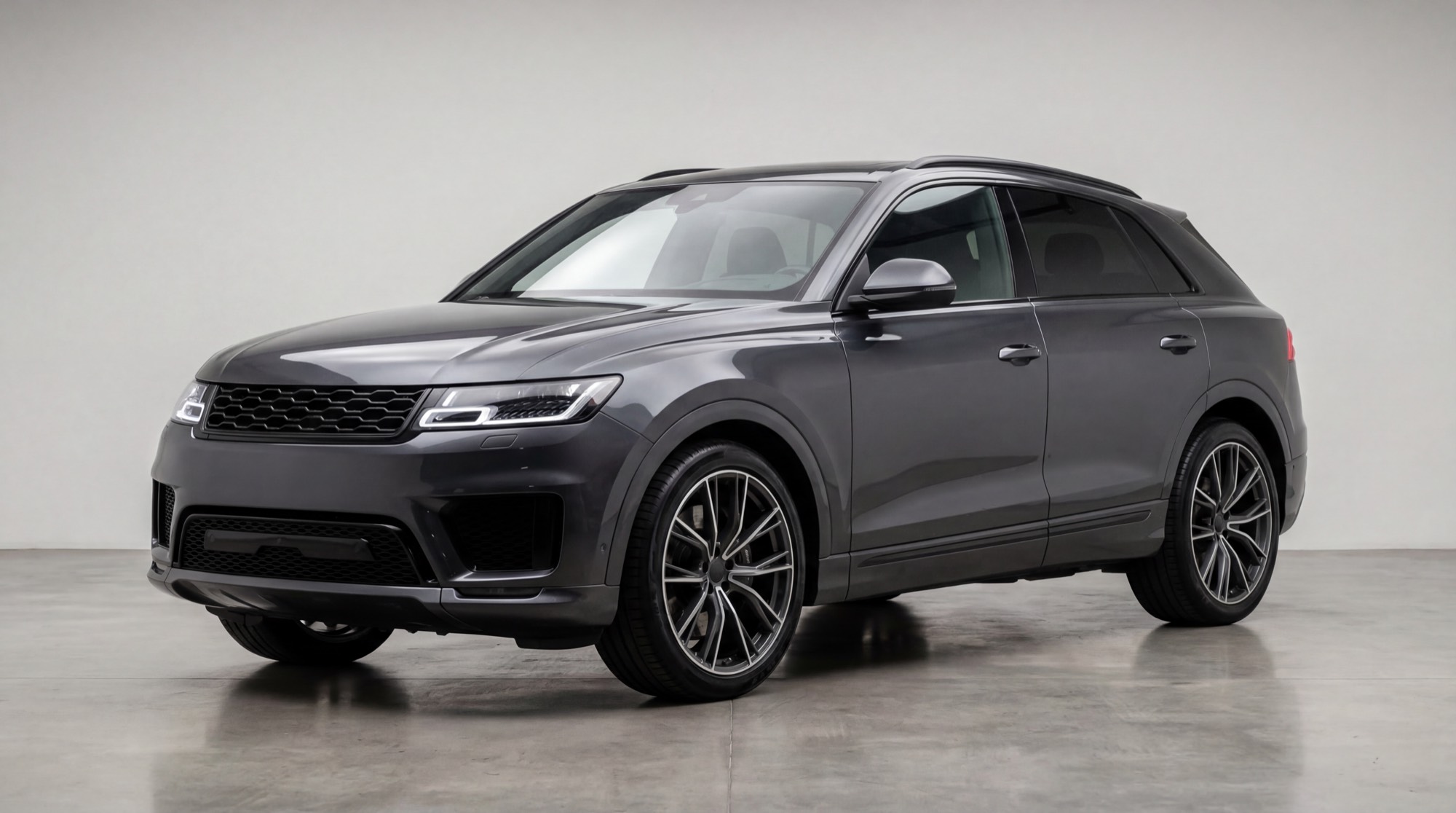 A sleek premium SUV in a clean studio setting.